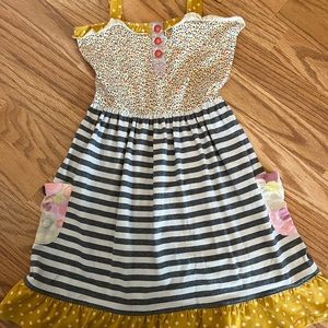 Matilda Jane sundress. Size 8. There are a couple spots in pictures. Cute detail